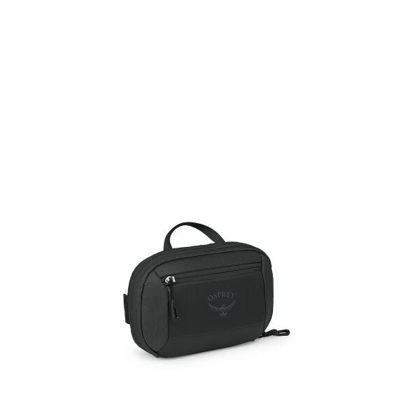 The images show a compact black Osprey pouch or small travel bag. It has a rounded rectangular shape with a short top handle and a front zip pocket bearing the Osprey logo. A main zipper runs around the top and sides, and there's a small side attachment p