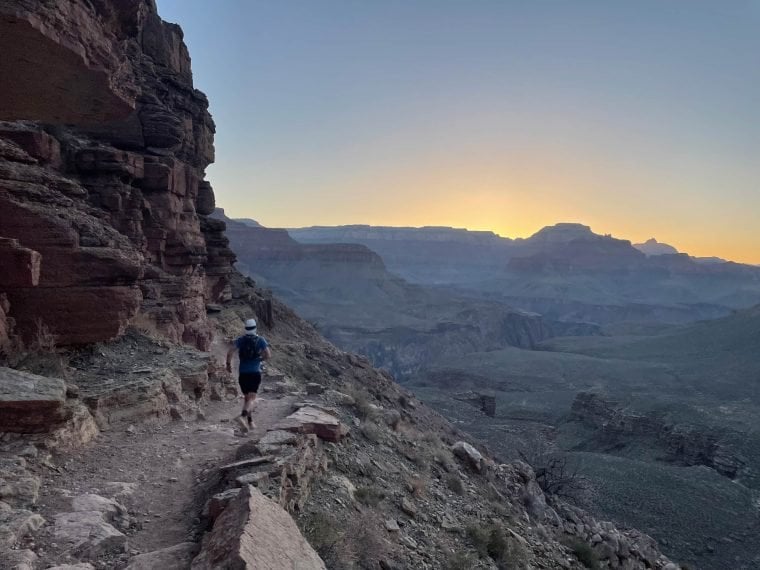 A man running rim to rim to rim at the Grand Canyon