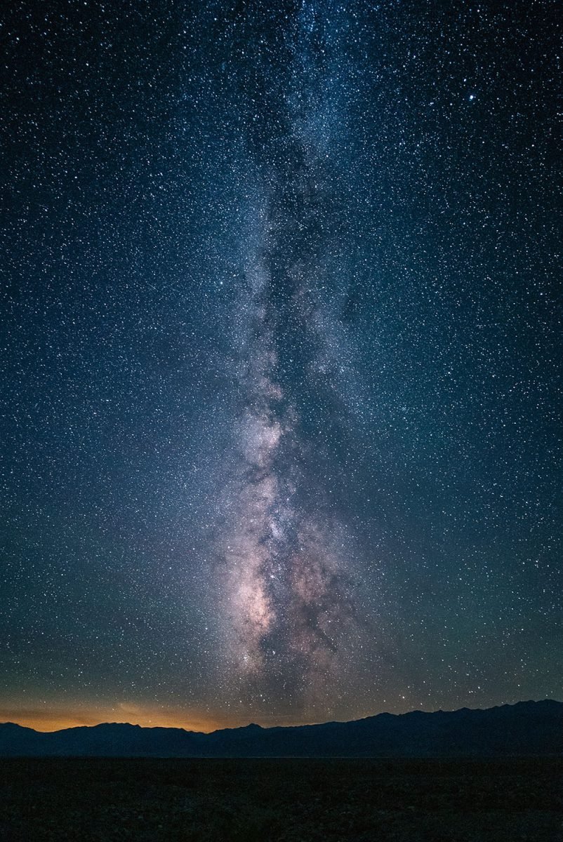 A spanning view of a starry night sky in Death Valley National Monument